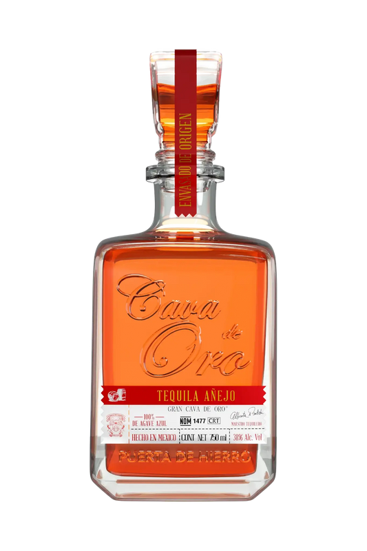 Cava de Oro Tequila Anejo - Viereckige Flasche mit bernsteinfarbenem Inhalt und rotem Etikette